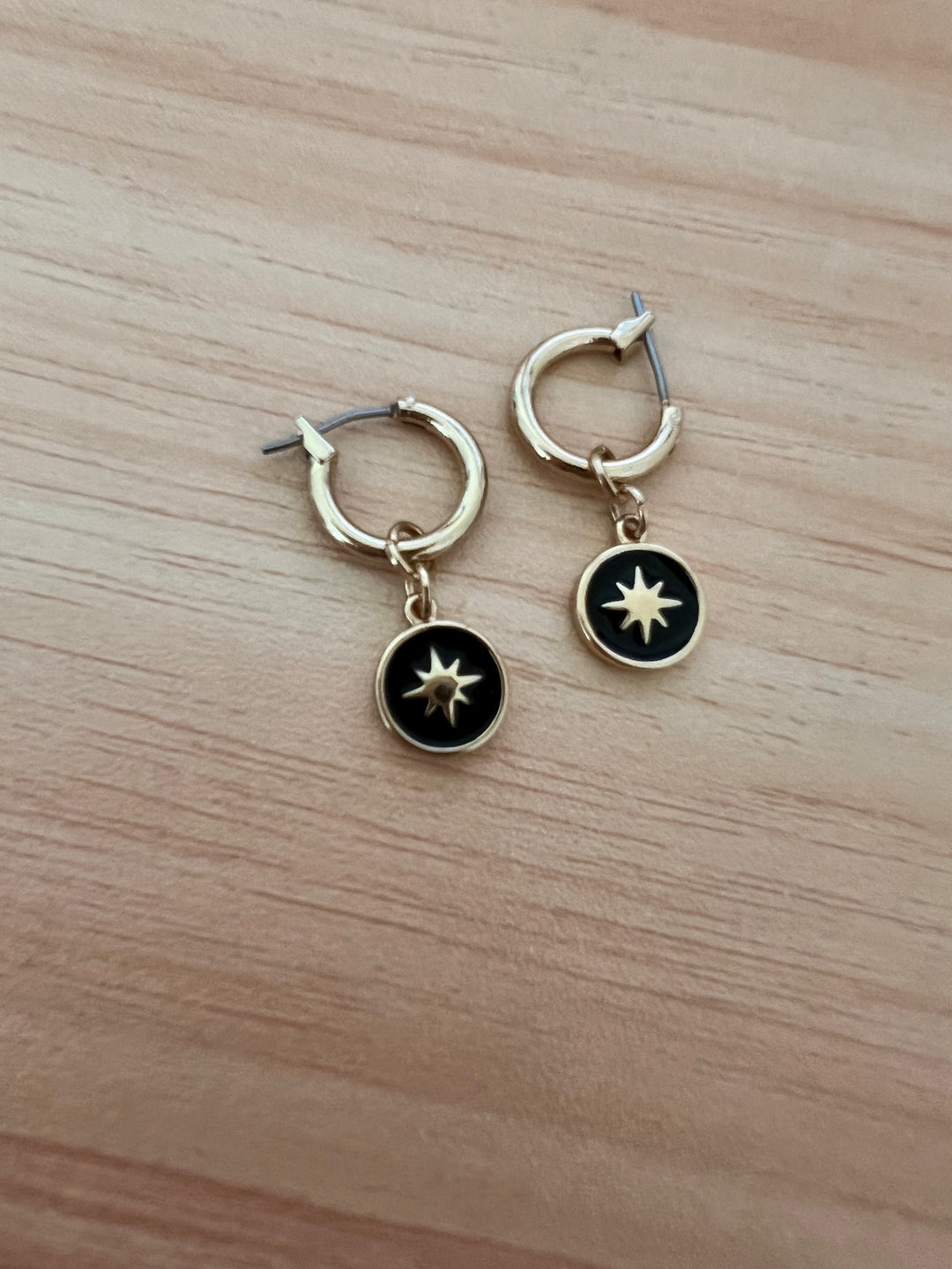 Gold Black Star Huggies Hoop Earrings, Minimalist gold star on black round charm huggie hoops designed for everyday. These 10mm hoops
