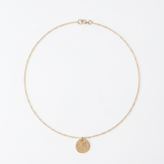hand stamped gold constellation disk necklace