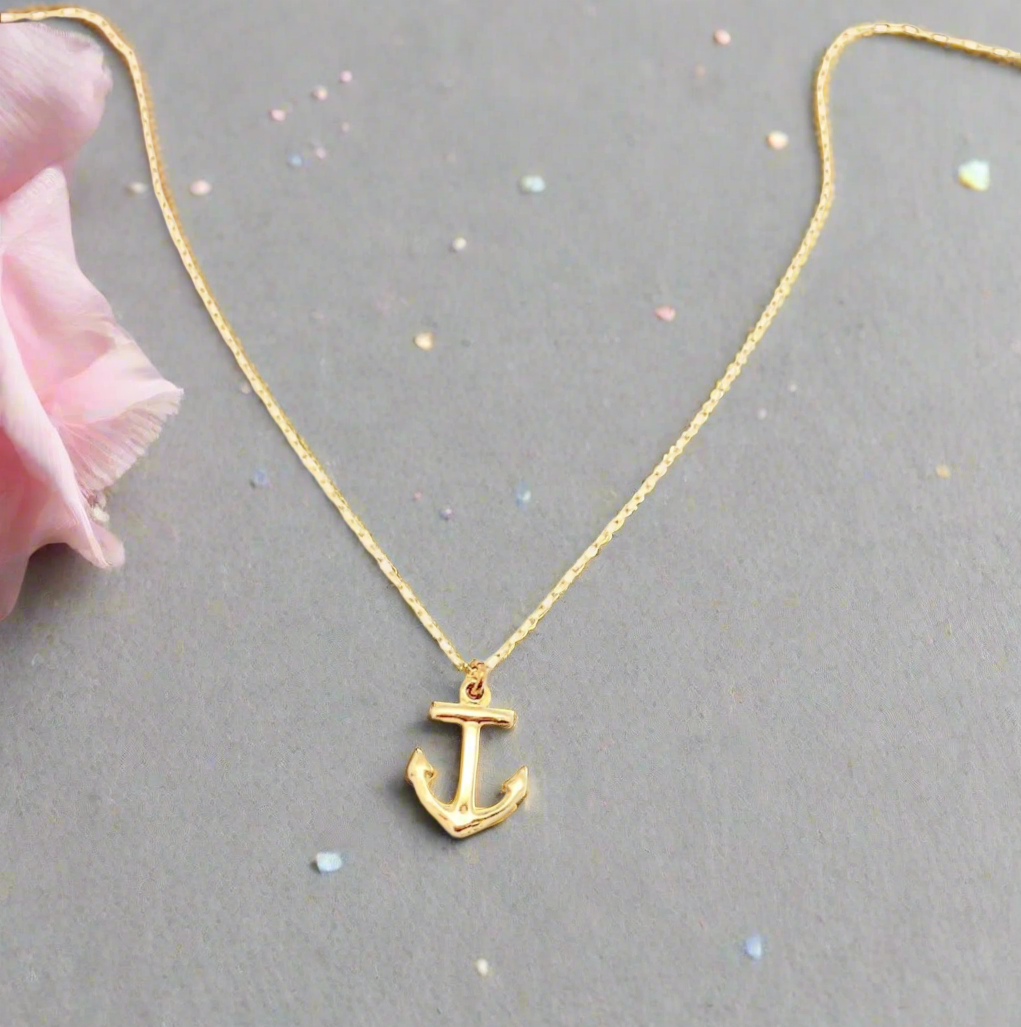 14K Tiny Gold Anchor Charm Necklace, our tiny anchor charm necklace has a tiny 14k gold anchor charm on 14k gold-filled chain, a ocean or boat lovers s