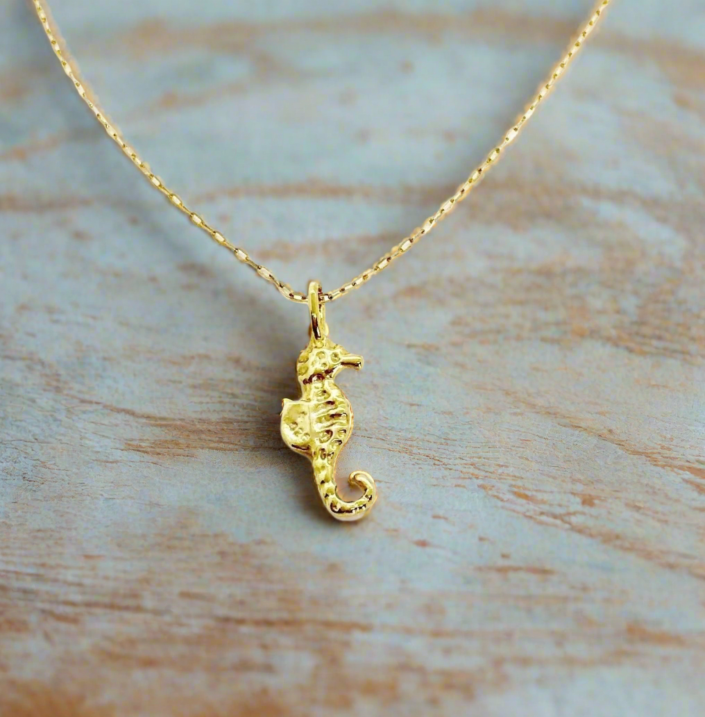 14K Gold Sea Horse Charm Necklace, our tiny gold sea horse charm on 14k gold-filled chain, is a sweet & petite necklace with a lot of charm, 