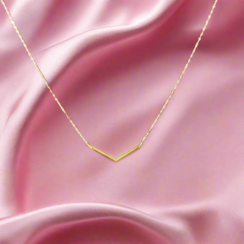 14K Gold Chevron V Bar Charm Necklace, our petite chevron V bar charm on 14k gold-filled chain equals a sweet minimalist charm necklace for everyday wear.
