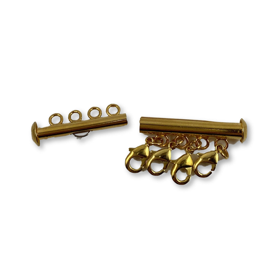 Gold Necklace Spacer Tube For Four Necklaces, our necklace spacer lets you layer up to four necklaces without tangling. It features four small gold-plated lobster clasps 