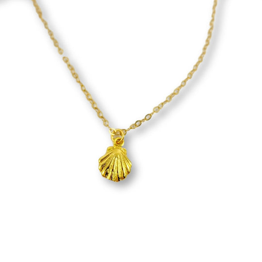 14K Gold Tiny Mermaid Shell Charm Necklace, our tiny mermaid clam shell charm is on 14k gold-filled chain, with a textured front like a clam shell, t