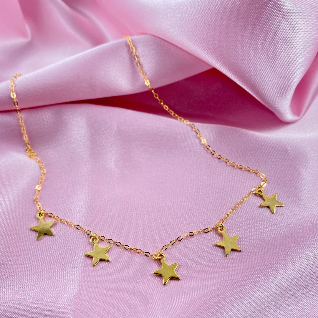 Gold Star Choker Necklace Minimalist Jewelry, Five Sweet & Petite Gold Stars hang on 14k gold filled chain with a lobster clasp for a secure closure. 