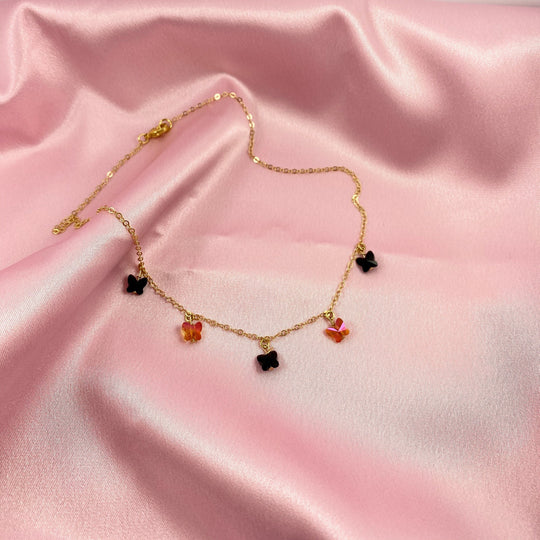 Black & Astral Pink Crystal Butterfly Choker Necklace, Add a touch of charm with the Black & Astral Pink Butterfly Choker Necklace, a delightful chain of crystal butterflies 
