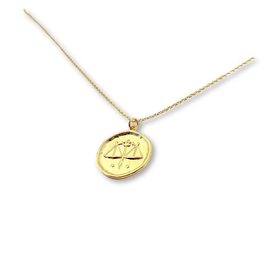 Libra Zodiac Sign Gold Necklace, this hand crafted Libra Zodiac Sign Necklace features a 14K gold-filled chain and an 18K vermeil gold charm. A