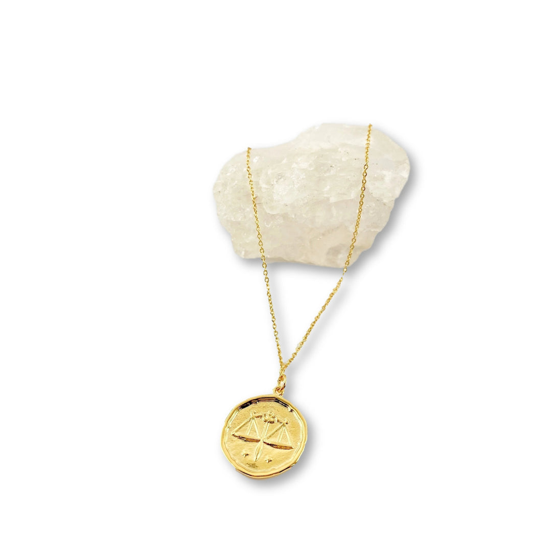 Libra Zodiac Sign Gold Necklace, this hand crafted Libra Zodiac Sign Necklace features a 14K gold-filled chain and an 18K vermeil gold charm. A
