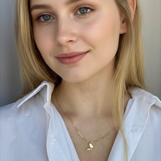 14K Gold Butterfly Charm Necklace, our tiny 14k gold butterfly necklace features a lightweight gold butterfly charm on 14k gold-filled chain, an irresistible dainty charm necklace.