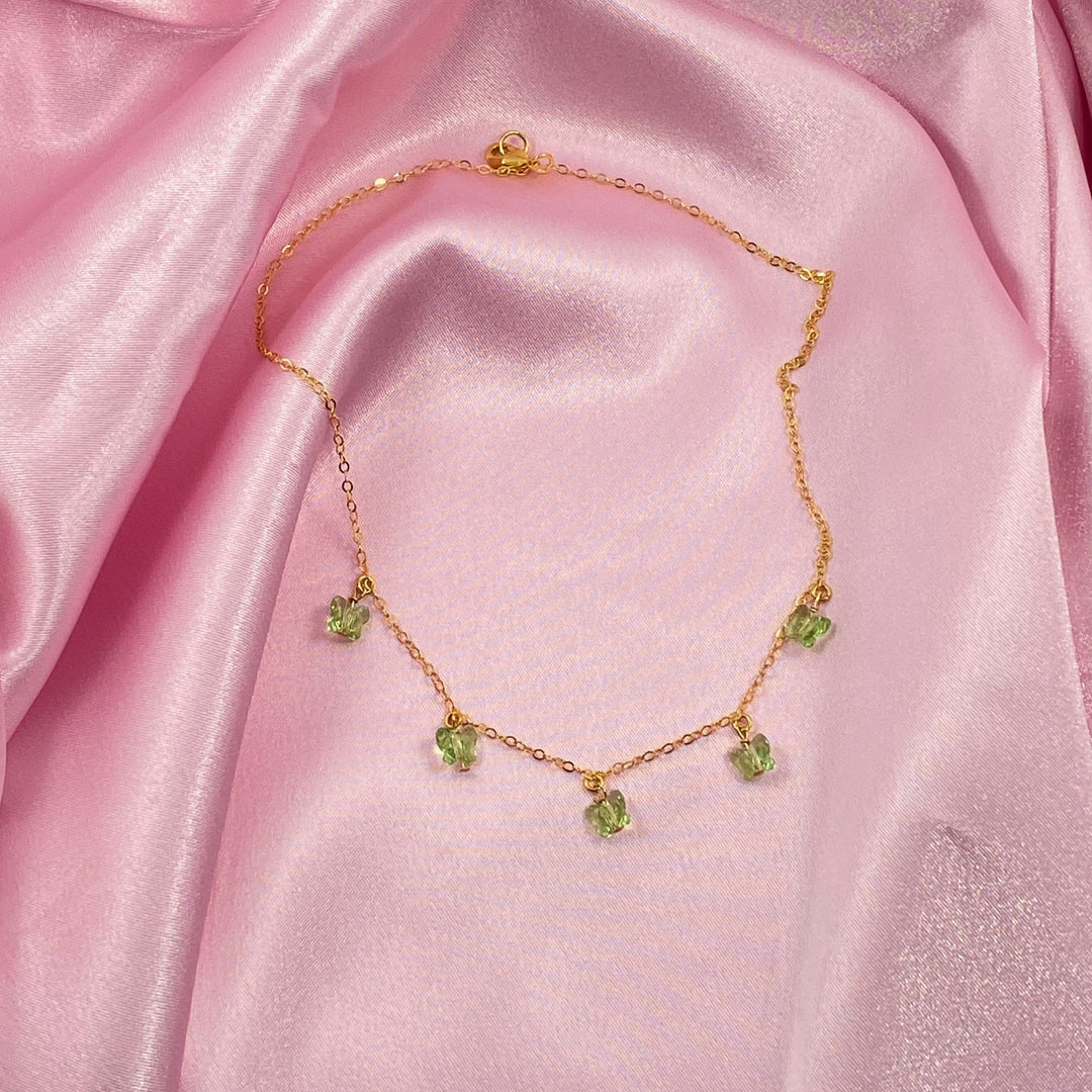 Peridot Green Butterfly Choker Necklace , Add a touch of charm with the Peridot Green Butterfly Choker Necklace, a delightful chain of crystal butterflies