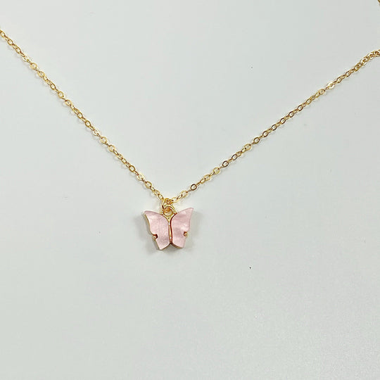 Pink Pearl Butterfly Necklace, is perfect for adding a petite, minimalist charm to any look. Lightweight and eye-catching, the 14K gold filled chain 