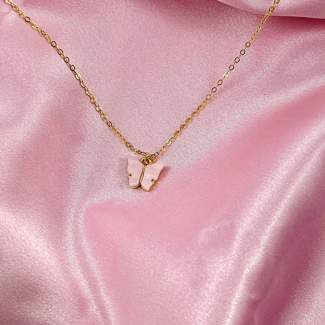 Pink Pearl Butterfly Necklace, is perfect for adding a petite, minimalist charm to any look. Lightweight and eye-catching, the 14K gold filled chain 
