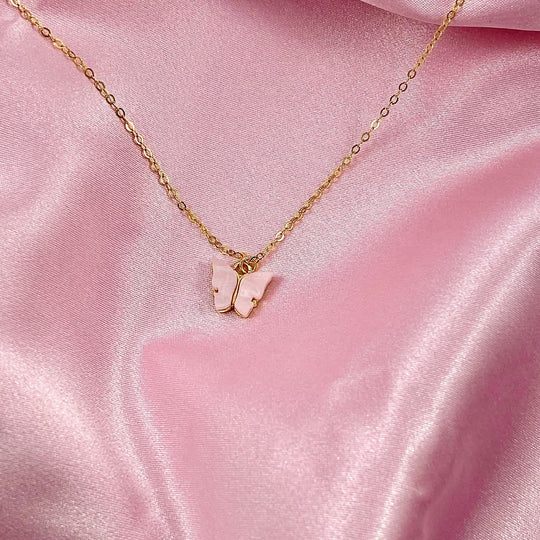 Pink Pearl Butterfly Necklace, is perfect for adding a petite, minimalist charm to any look. Lightweight and eye-catching, the 14K gold filled chain 