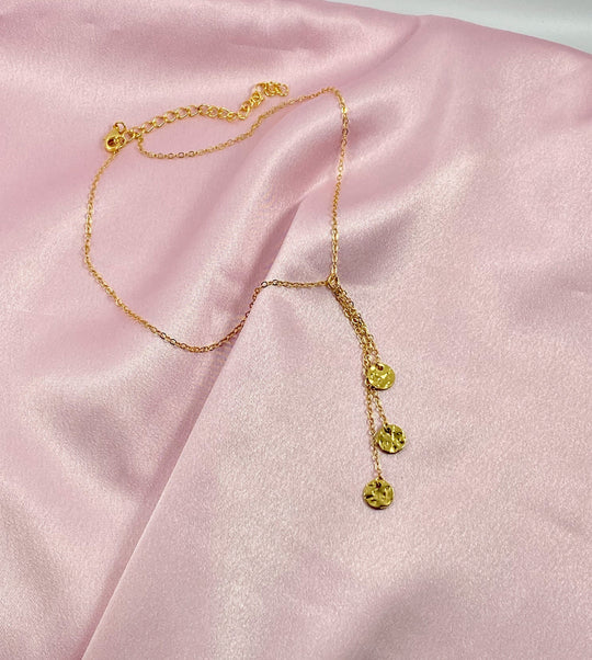 14K Gold Circle Choker Necklace, our delicate gold choker features three petite hammered circle charms on a 14k gold-filled chain with a lobster clasp.