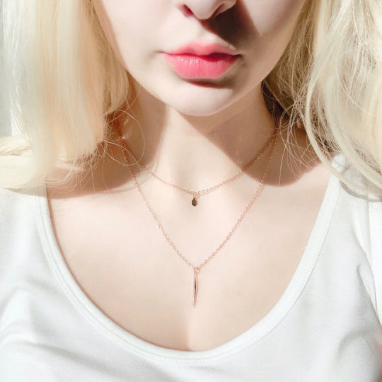 Rose Gold Needle Spike Charm Necklace, our dainty necklace features a minimalist rose gold needle spike charm suspended from a slender rose gold chain