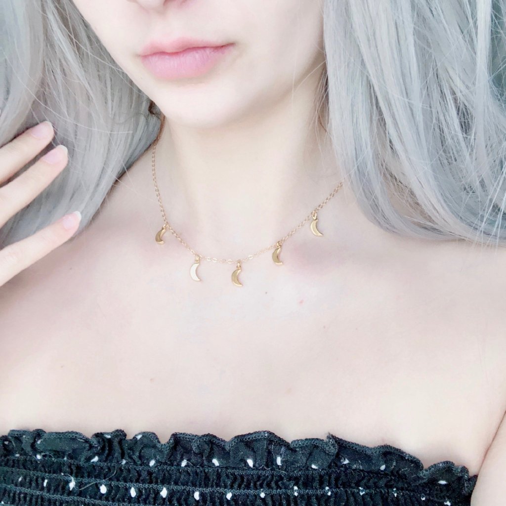 Gold Moon Charm Choker Necklace, our Gold Moon Choker Necklace has five tiny gold crescent moons on 14k gold filled chain. It's design is simple and timeless, a minimalist charm necklace.