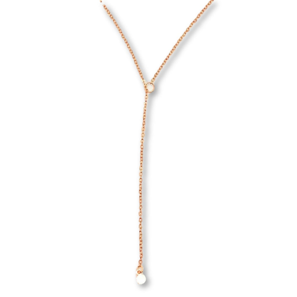 Rose Gold Dot Lariat Charm Necklace, a tiny rose gold dot charm hangs from the sparkling rose gold chain as a lariat with a petite rose gold circle for the slide through
