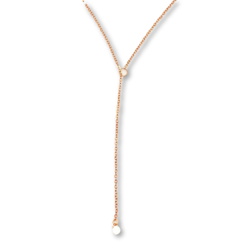 Rose Gold Dot Lariat Charm Necklace, a tiny rose gold dot charm hangs from the sparkling rose gold chain as a lariat with a petite rose gold circle for the slide through