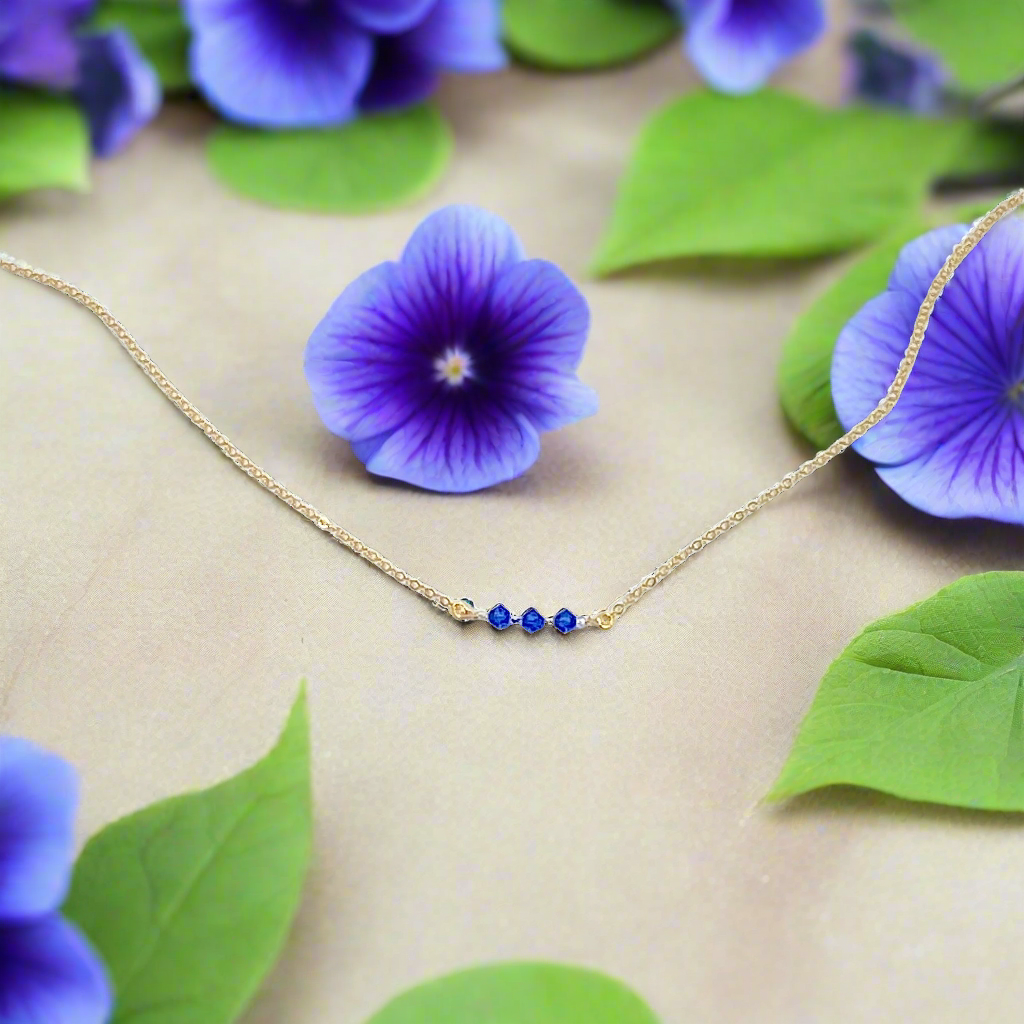 Blue Crystal Bar Necklace Hand Made Jewelry, this hand made Blue Crystal Bar Necklace combines minimalist vibes with a boho twist. Featuring three dazzling crystals 