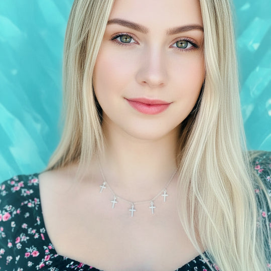 Silver Cross Choker Chain Necklace, made with sterling silver, our Silver Cross Choker Chain Necklace has a subtle dainty touch with tiny silver crosses, making it a unique blend of charm and grace.