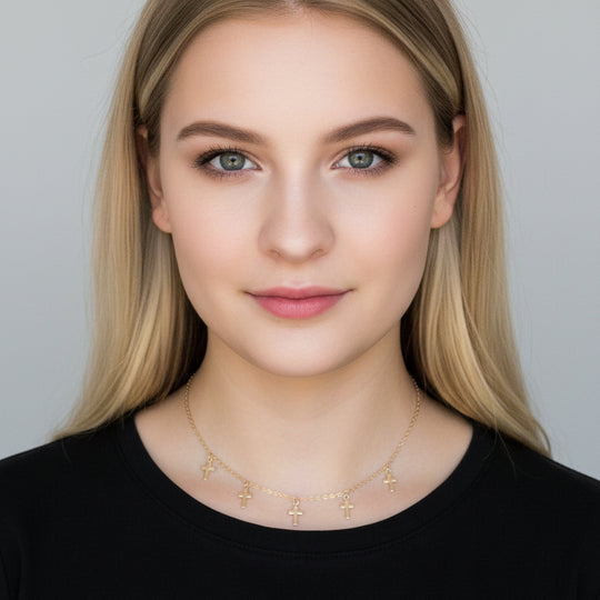 Gold Cross Choker Chain Necklace, is a delicate piece with tiny gold crosses on 14k gold-filled chain. It's adoring charm makes it versatile and unique.