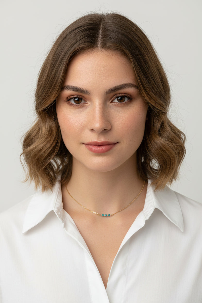 This Handmade Turquoise Blue Crystal Bar Necklace combines minimalist vibes with a boho twist. Featuring three dazzling crystals set on a 14k gold-filled chain