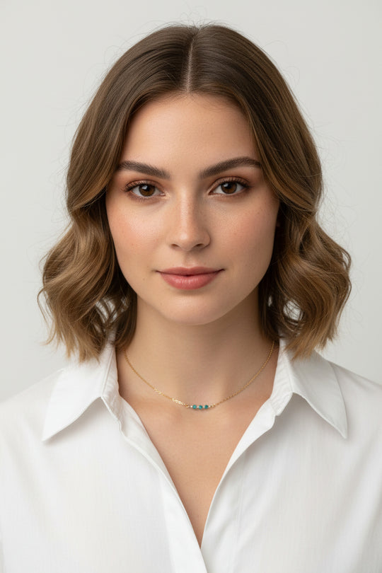 This Handmade Turquoise Blue Crystal Bar Necklace combines minimalist vibes with a boho twist. Featuring three dazzling crystals set on a 14k gold-filled chain
