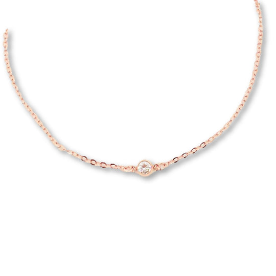 Rose Gold Cubic Zirconia Solitaire Necklace, this tiny rose gold cubic zirconia solitaire crystal charm in a rose gold bezel frame, offers a sweet & petite tiny sparkle on rose gold chain.