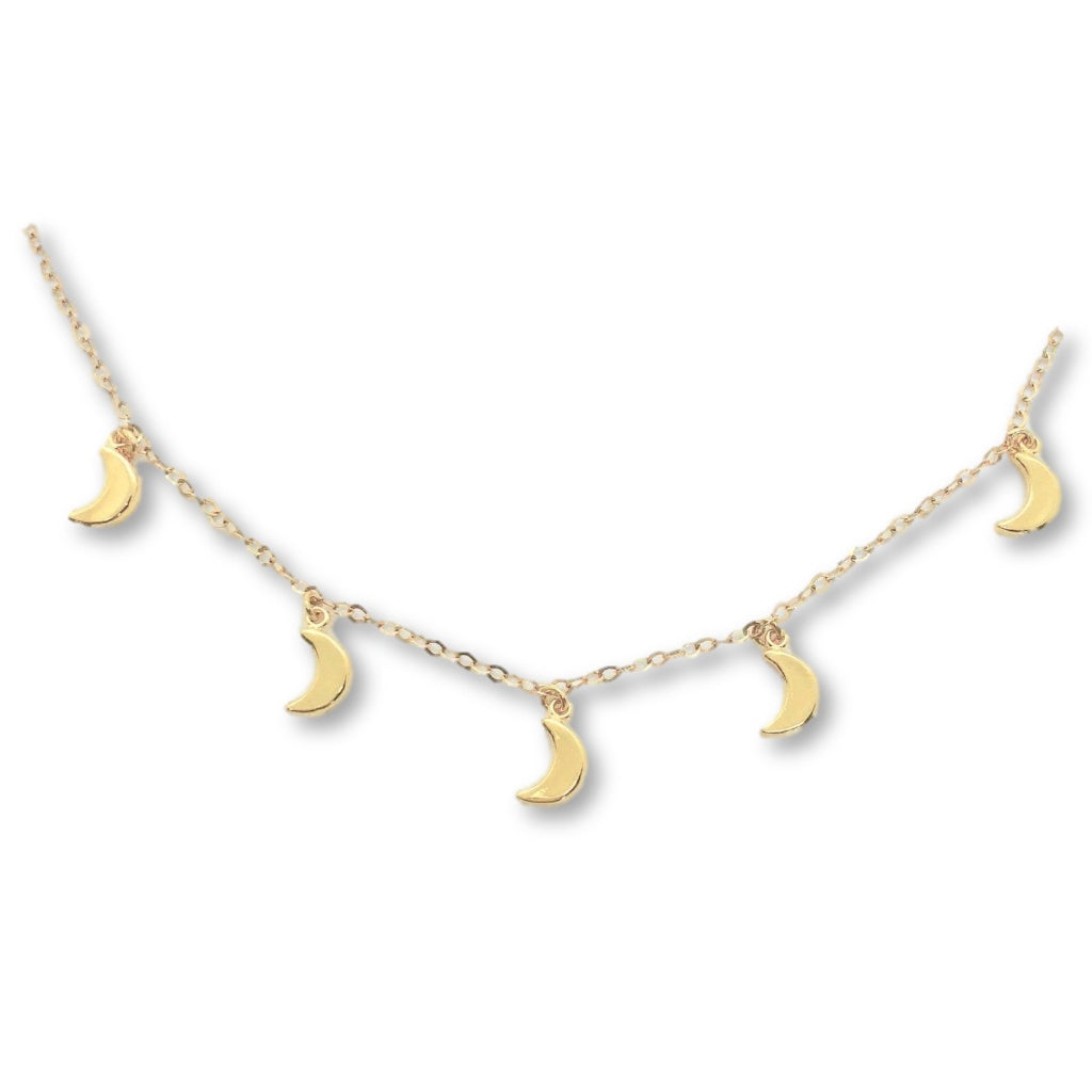 Gold Moon Charm Choker Necklace, our Gold Moon Choker Necklace has five tiny gold crescent moons on 14k gold filled chain. It's design is simple and timeless, a minimalist charm necklace.