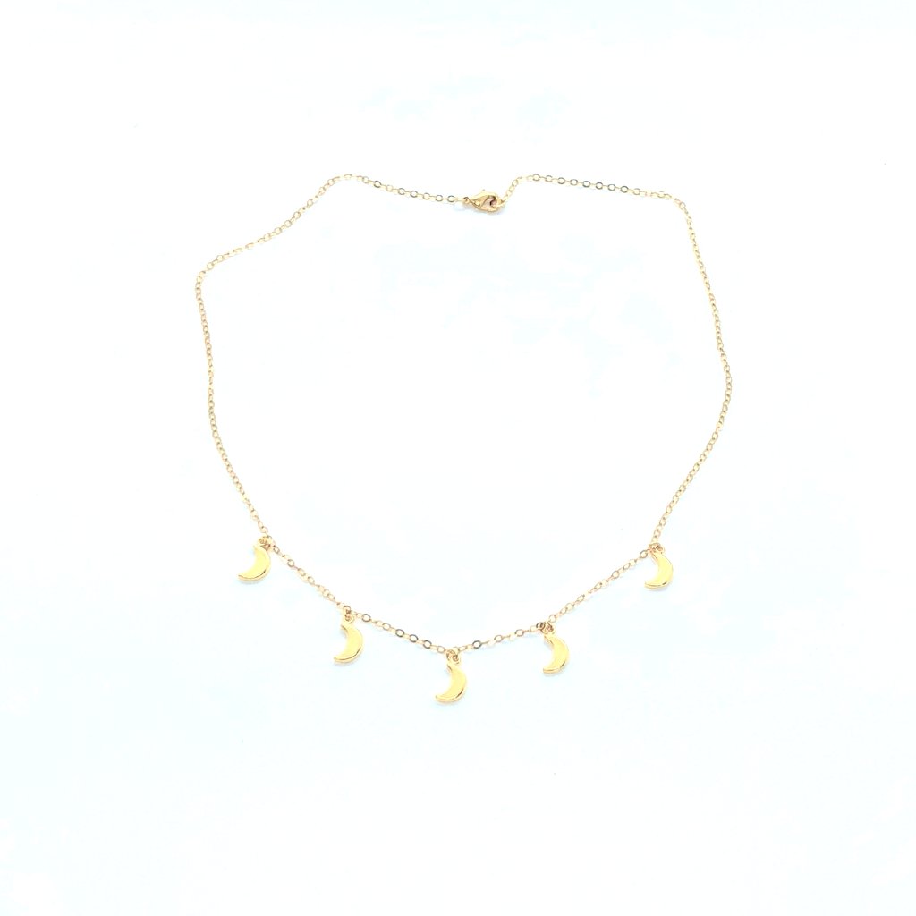 Gold Moon Charm Choker Necklace, our Gold Moon Choker Necklace has five tiny gold crescent moons on 14k gold filled chain. It's design is simple and timeless, a minimalist charm necklace.
