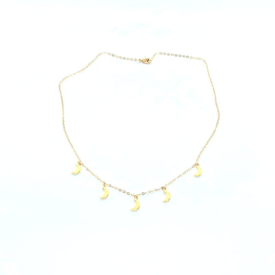 Gold Moon Charm Choker Necklace, our Gold Moon Choker Necklace has five tiny gold crescent moons on 14k gold filled chain. It's design is simple and timeless, a minimalist charm necklace.