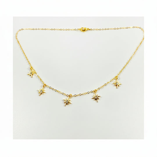 Tiny Star Charm Choker Necklace, hand crafted with tiny gold stars that have a sparkling cubic zirconia crystal center, on 14k gold-filled chain. A unique blend of a sweet & petite jewelry treasure.