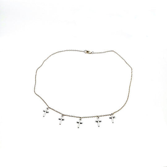 Silver Cross Choker Chain Necklace, made with sterling silver, our Silver Cross Choker Chain Necklace has a subtle dainty touch with tiny silver crosses, making it a unique blend of charm and grace.