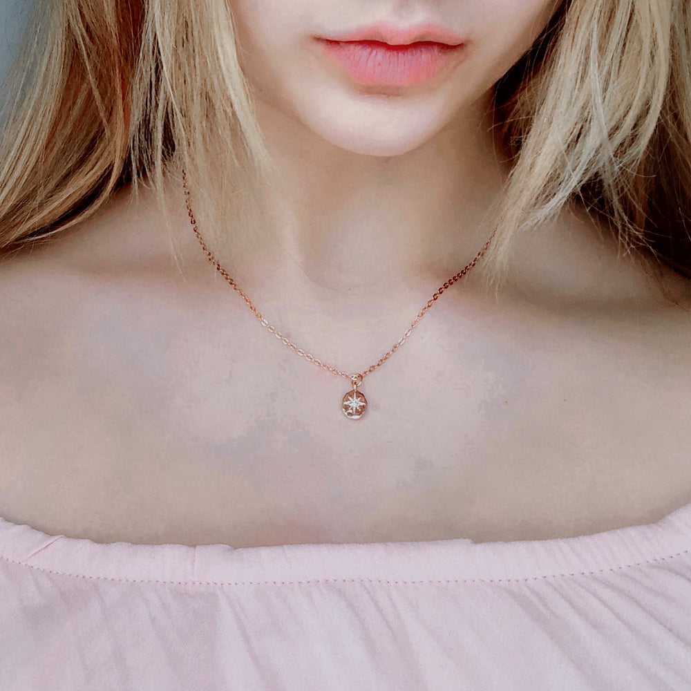 Rose Gold Compass Star Charm Necklace, this tiny rose gold hammered compass charm has a sparkling crystal center star, with minimalist design