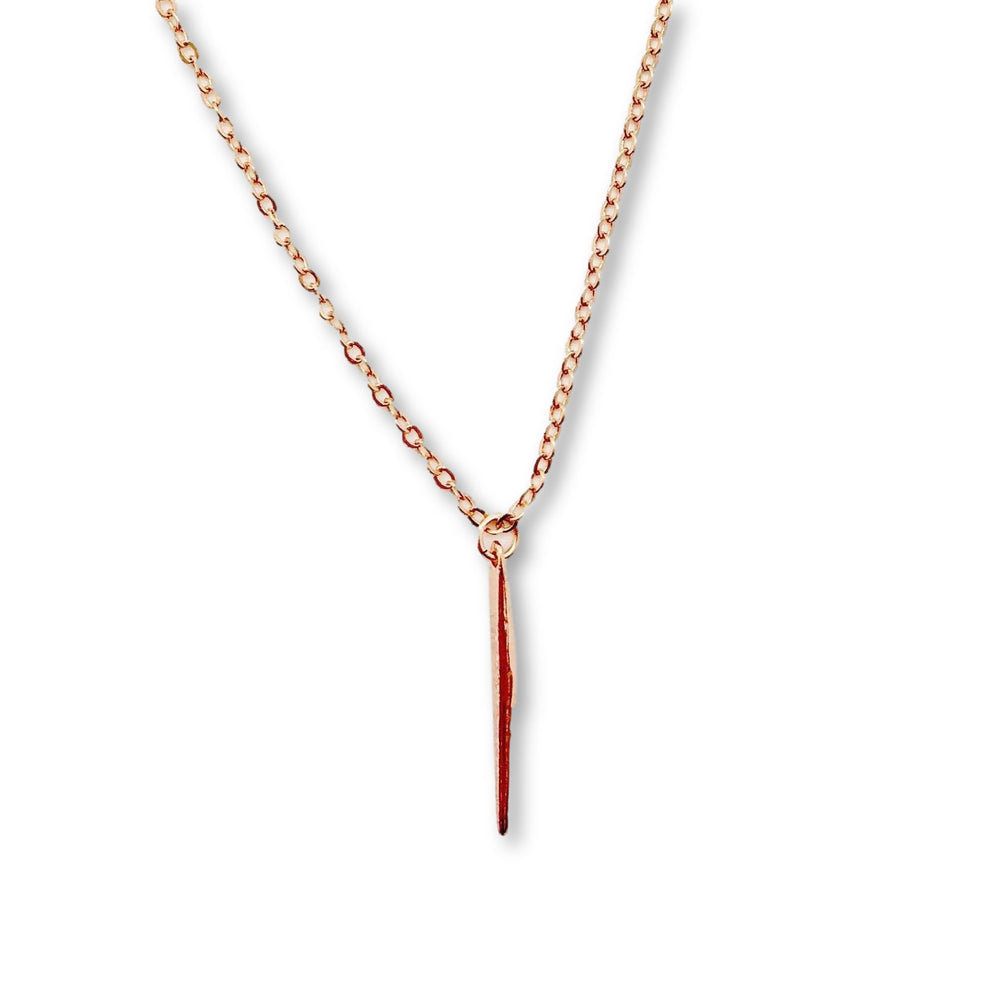 Rose Gold Needle Spike Charm Necklace, our dainty necklace features a minimalist rose gold needle spike charm suspended from a slender rose gold chain
