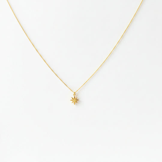 14K Gold North Star Charm Necklace, our eight-point North Star Charm Necklace has a tiny gold 8 point star charm on 14k gold-filled chain, it's a charming 