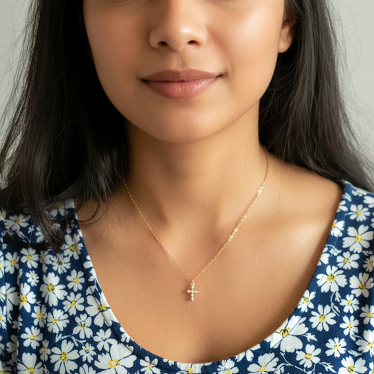 14K Gold Cubic Zirconia Cross Charm Necklace, our delicate 14k gold necklace features a small cubic zirconia crystal cross charm on a 14k gold-filled chain