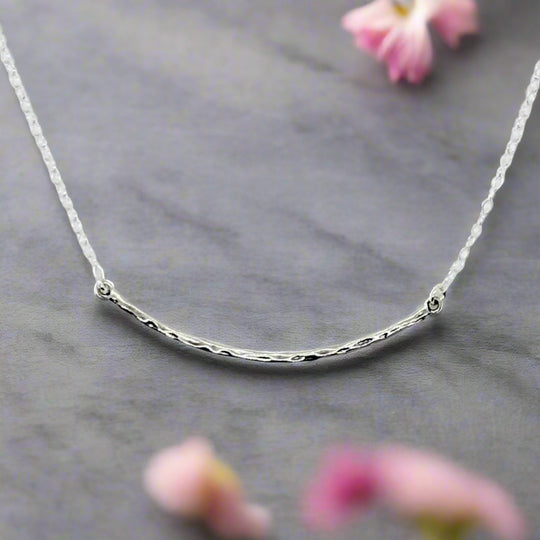 Silver Curved Skinny Bar Necklace, our delicate sterling silver necklace with a hand crafted hammered curved skinny bar on sterling silver chain, minimalist style charm necklace.