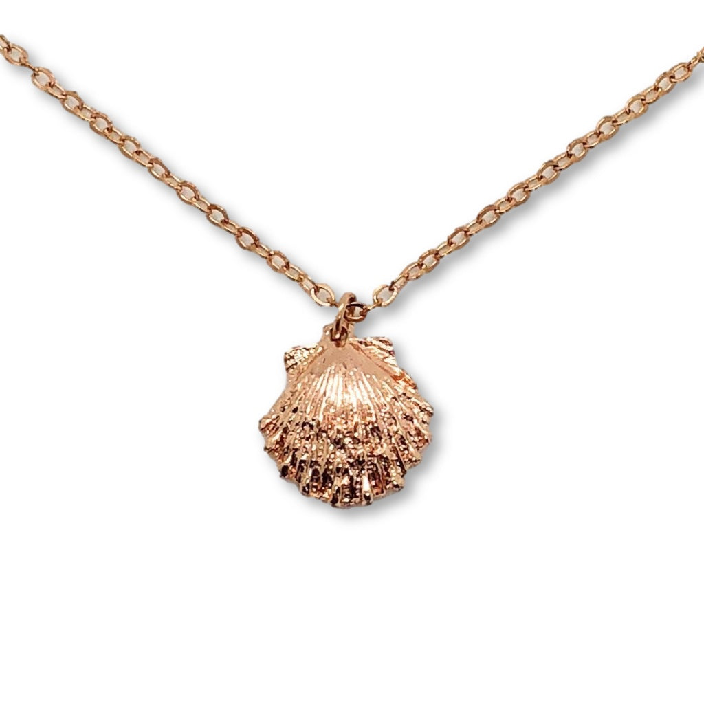 Rose Gold Mermaid Shell Charm Necklace, with it's textured surface, this vibrant rose gold mermaid clam shell sparkles in just the right places, it's beauty, on rose gold chain, makes a sweet treasure to adore.