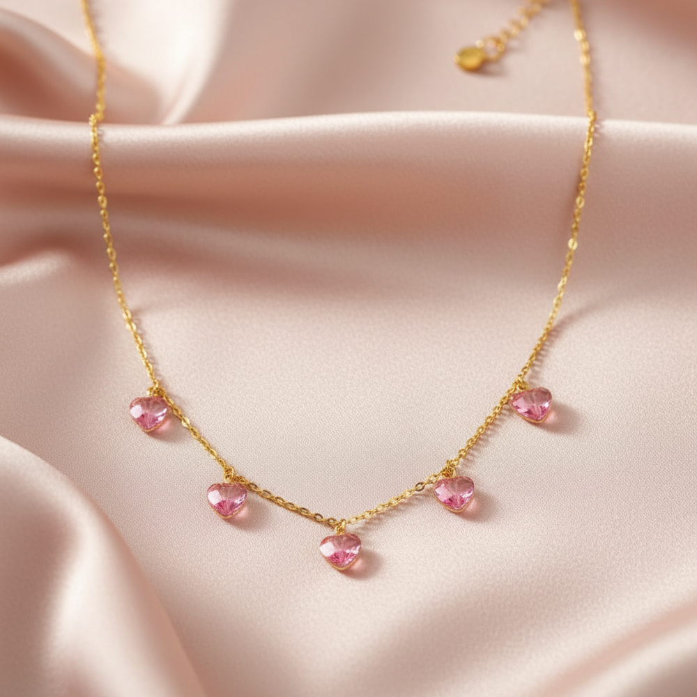 Pink Crystal Heart Necklace,  This Pink Crystal Heart Necklace is irresistibly sweet and petite, featuring five tiny heart-shaped crystals wire wrapped on a 14k gold filled chain 