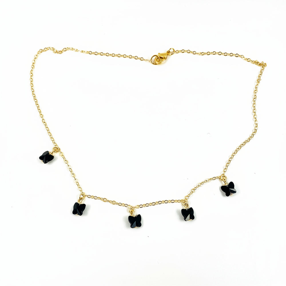 Black Crystal Butterfly Necklace featuring handcrafted black crystal butterflies on a delicate gold-fill chain.