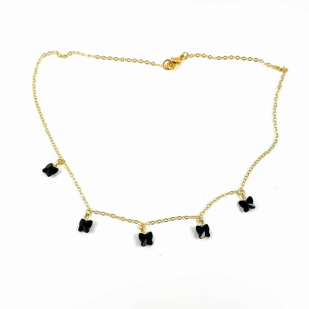 Black Crystal Butterfly Necklace featuring handcrafted black crystal butterflies on a delicate gold-fill chain.