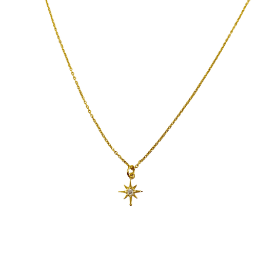14K Gold Eight Point Star Charm Necklace, our dainty gold star necklace has an eight-point star charm with a cubic zirconia center on a 14k gold-filled chain