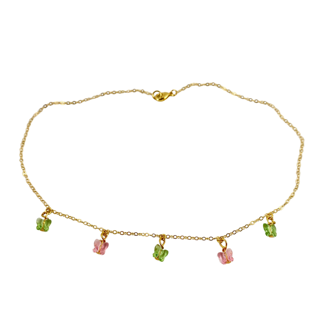 Pink Peridot Green Crystal Butterfly Choker Necklace, Add a touch of charm with the Pink Peridot Butterfly Choker Necklace, a delightful chain of crystal butterflies