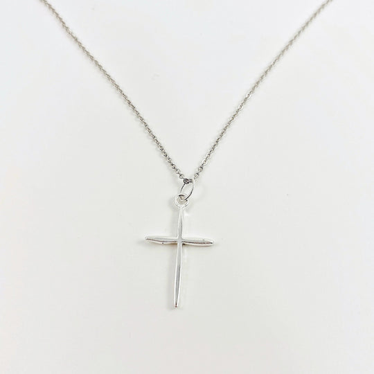 Sterling Silver Cross Necklace, on sterling silver chain, minimalist in style, a craftsman like silver cross charm.