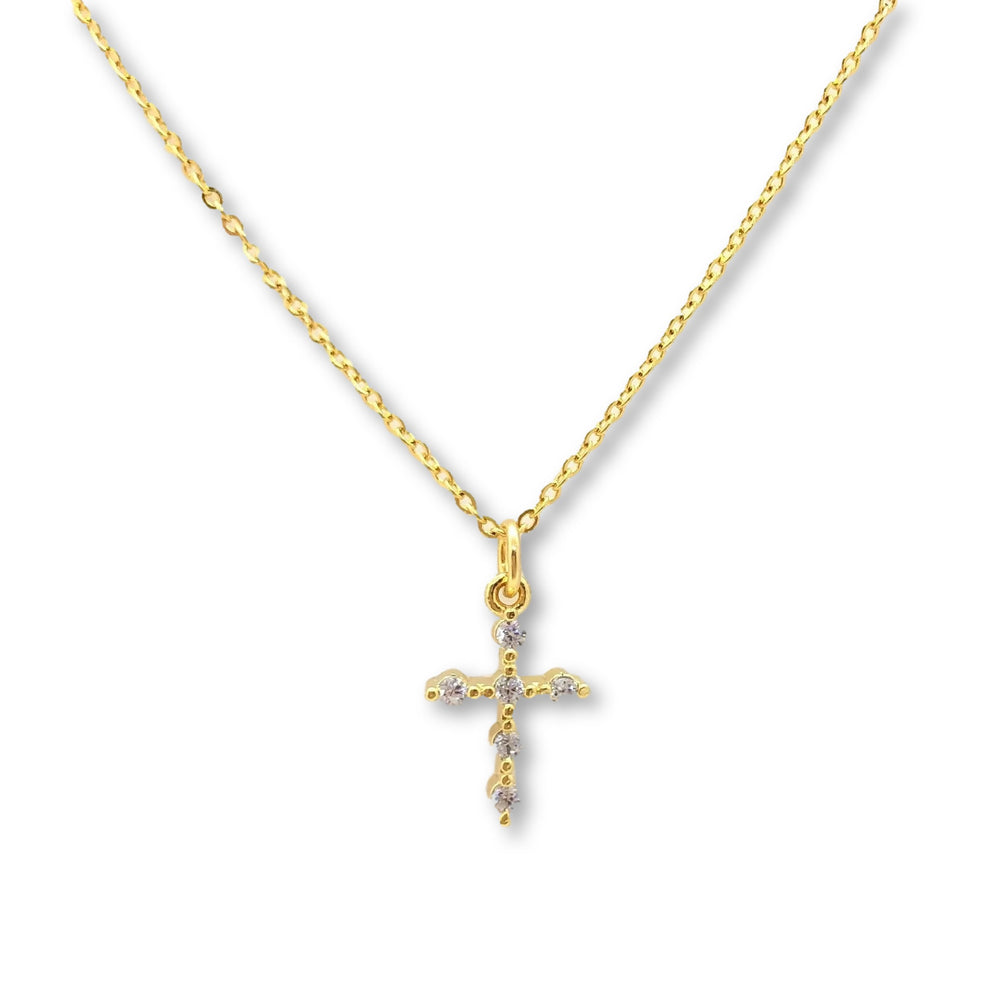 14K Gold Cubic Zirconia Cross Charm Necklace, our delicate 14k gold necklace features a small cubic zirconia crystal cross charm on a 14k gold-filled chain
