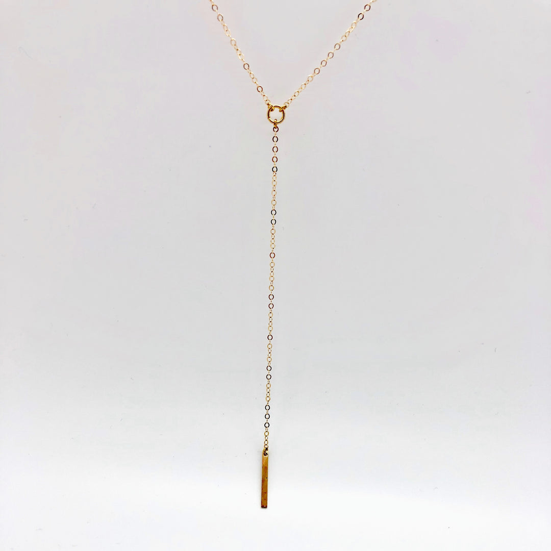 14K Gold Y Charm Necklace, our dainty 14k gold necklace features a tiny center circle and slim bar charm on 14k gold-filled chain, a charming petite minimalist 