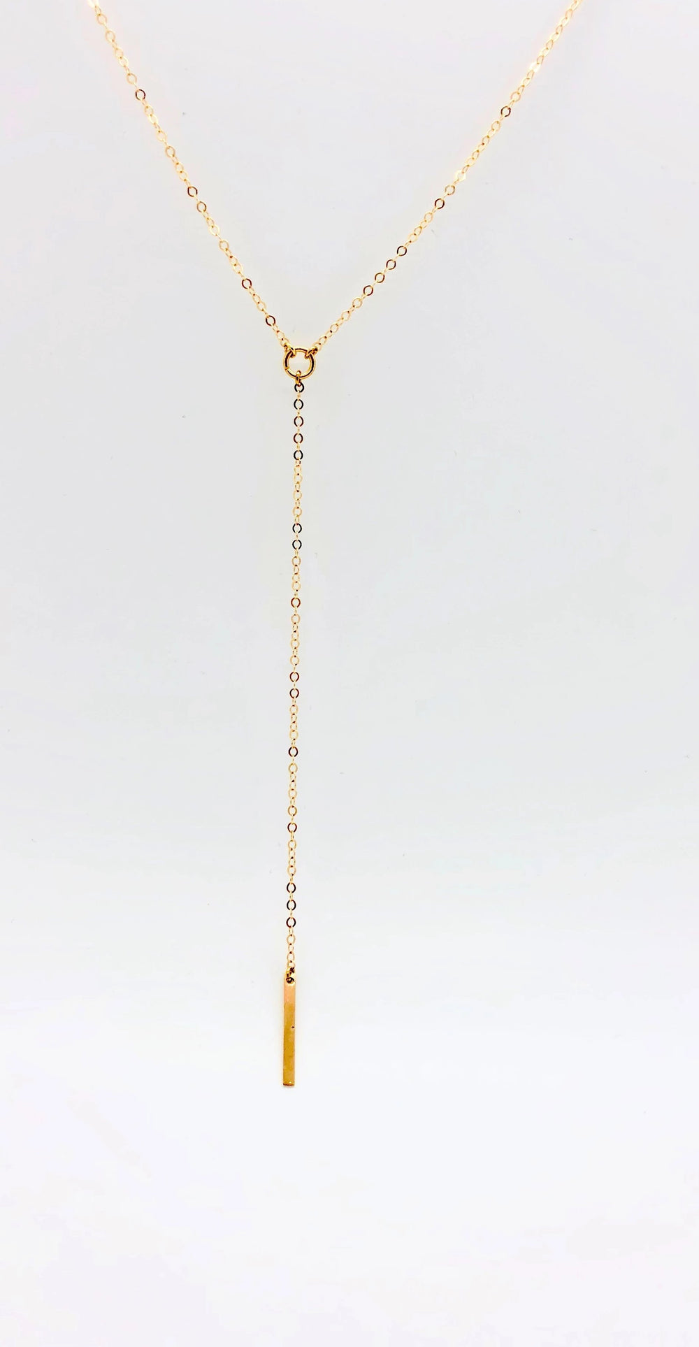 14K Gold Y Charm Necklace, our dainty 14k gold necklace features a tiny center circle and slim bar charm on 14k gold-filled chain, a charming petite minimalist 