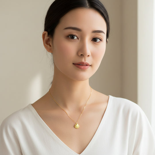 14K Gold Clam Shell Mermaid Charm Necklace, our dainty gold mermaid shell necklace has a small textured gold clam shell charm on a 14k gold-filled chain, a petite & sweet minimalist Summer charm necklace.