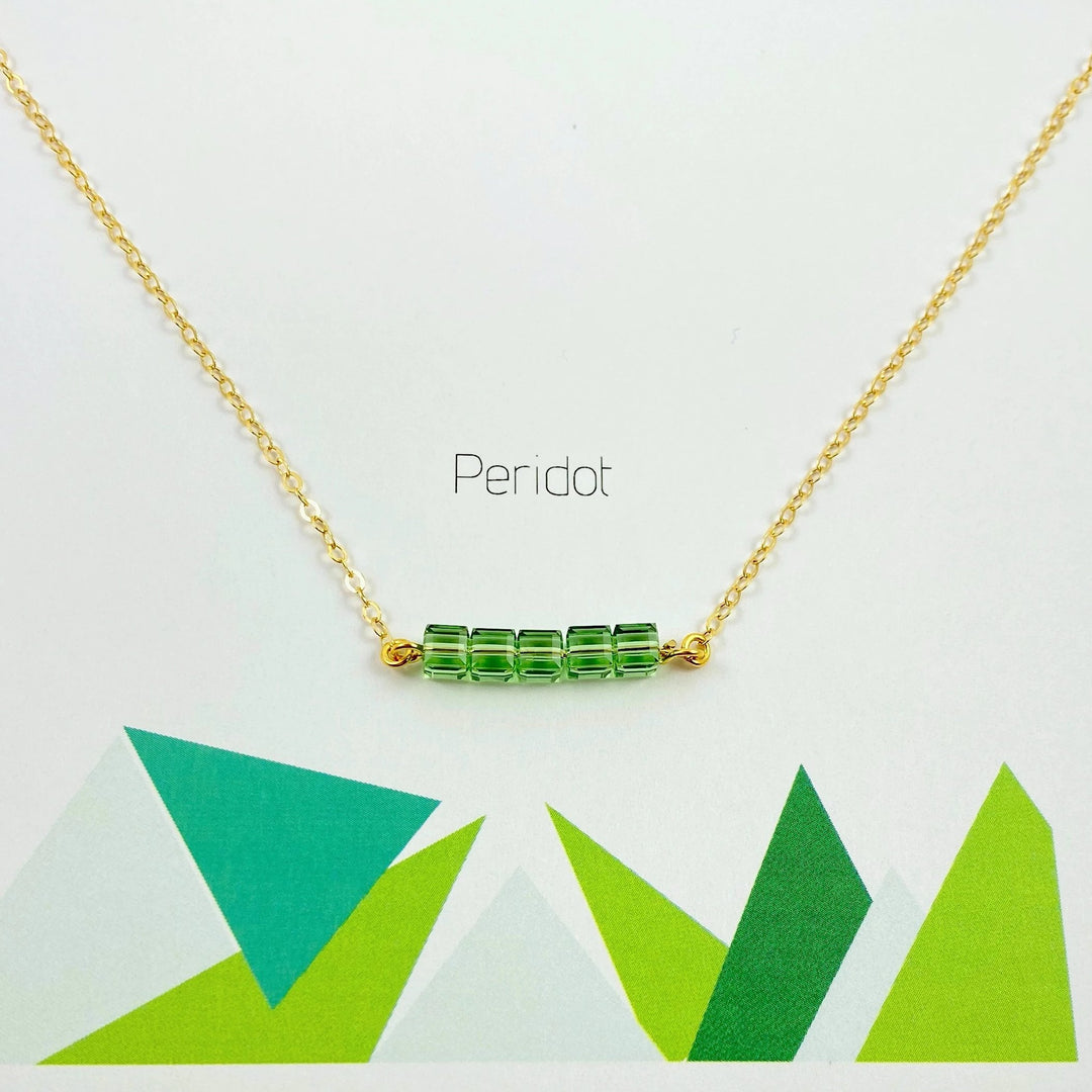 Peridot Green Crystal Cube Bar Necklace Charm Jewelry, styled as a minimalist crystal cube bar necklace featuring 5 mini facetted cubes i