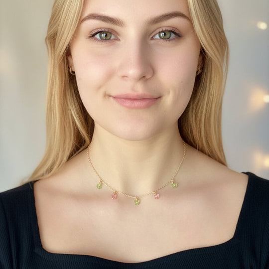 Pink Peridot Green Crystal Butterfly Choker Necklace, Add a touch of charm with the Pink Peridot Butterfly Choker Necklace, a delightful chain of crystal butterflies